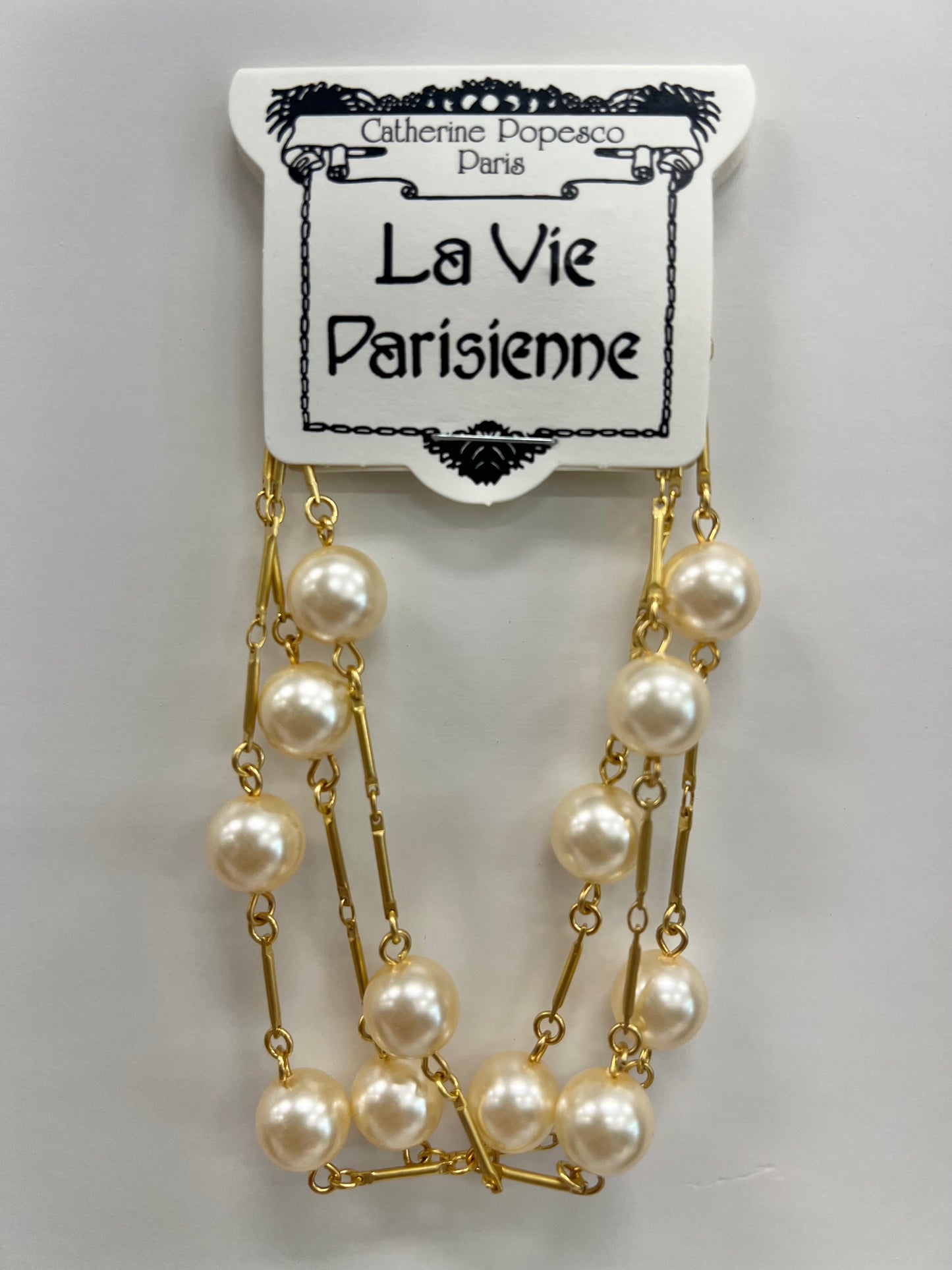 Triple Strand of Pearls Gold Bracelet
