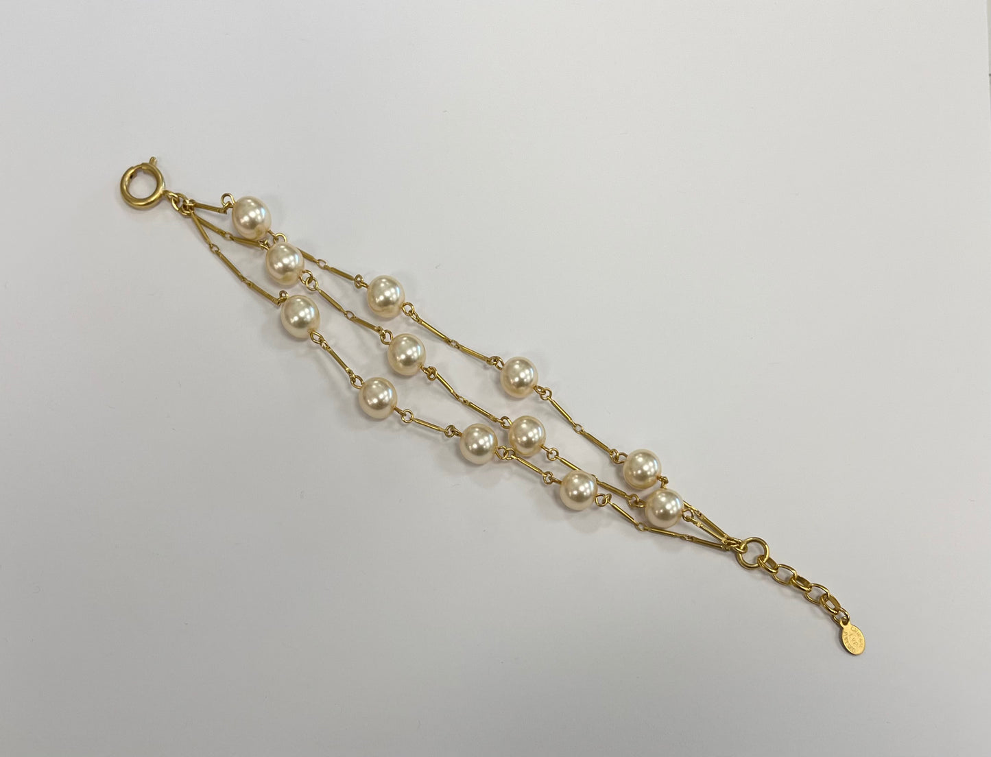 Triple Strand of Pearls Gold Bracelet