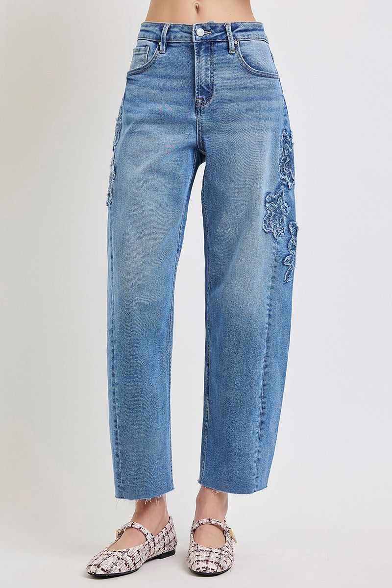 Risen barrel jeans flower patch close up