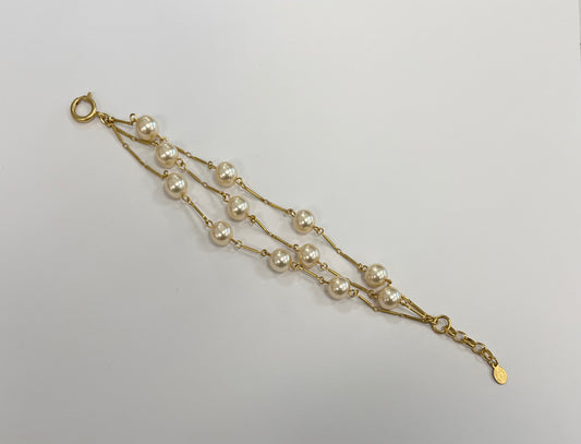 Triple Strand of Pearls Gold Bracelet