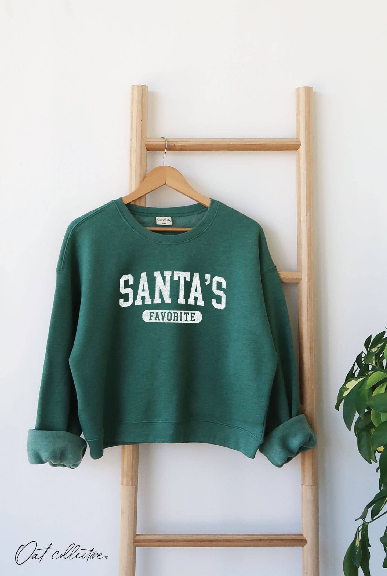 SANTA'S FAVORITE Mid Cropped Graphic Sweatshirt