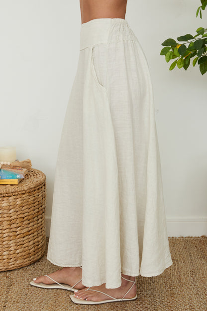 LINEN MAXI SKIRT WITH POCKETS AND SMOKED WAISTBAND